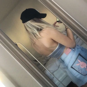 Playboy kjol - Kort kjol, med playboymärke målsat på höge bakficka