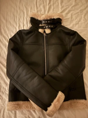 Completely New Leather Jacket Size XS - Very pretty leather jacket, new and no sign of damage, bought it , tried it on but it didn’t fit me and I cannot return it because I removed the tag, the price is high and suggesting a price is okay and highly appreciated 🩷