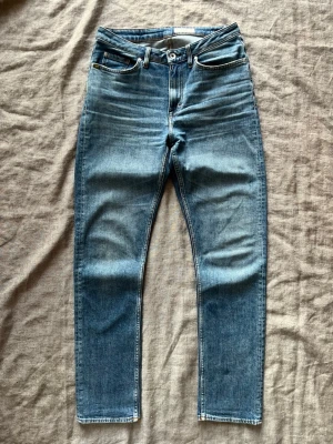 Ljusblå tvättade Tiger of Sweden jeans, 29/34 - Ljusblå tvättade Tiger of Sweden jeans i modellen Meg Inga defekter Hör av er vid frågor eller förhandling!