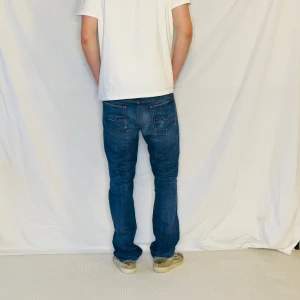 Blå Jeans från 7 for all mankind - Storlek 32. 