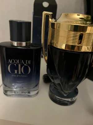 Parfymer  - Säljer två feta parfymer. Invictus parfum 90ml, aqua di gio 30 ml