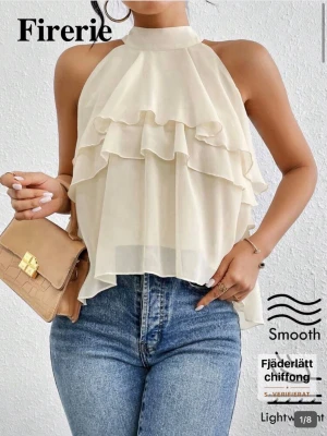 Beige volangtop  - Säljer en superfin beige volangtop! 