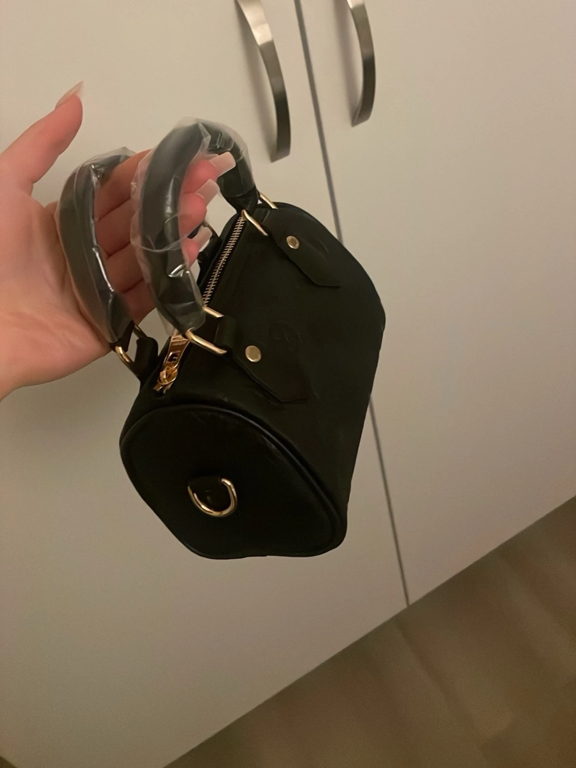 Svart mini lv bag