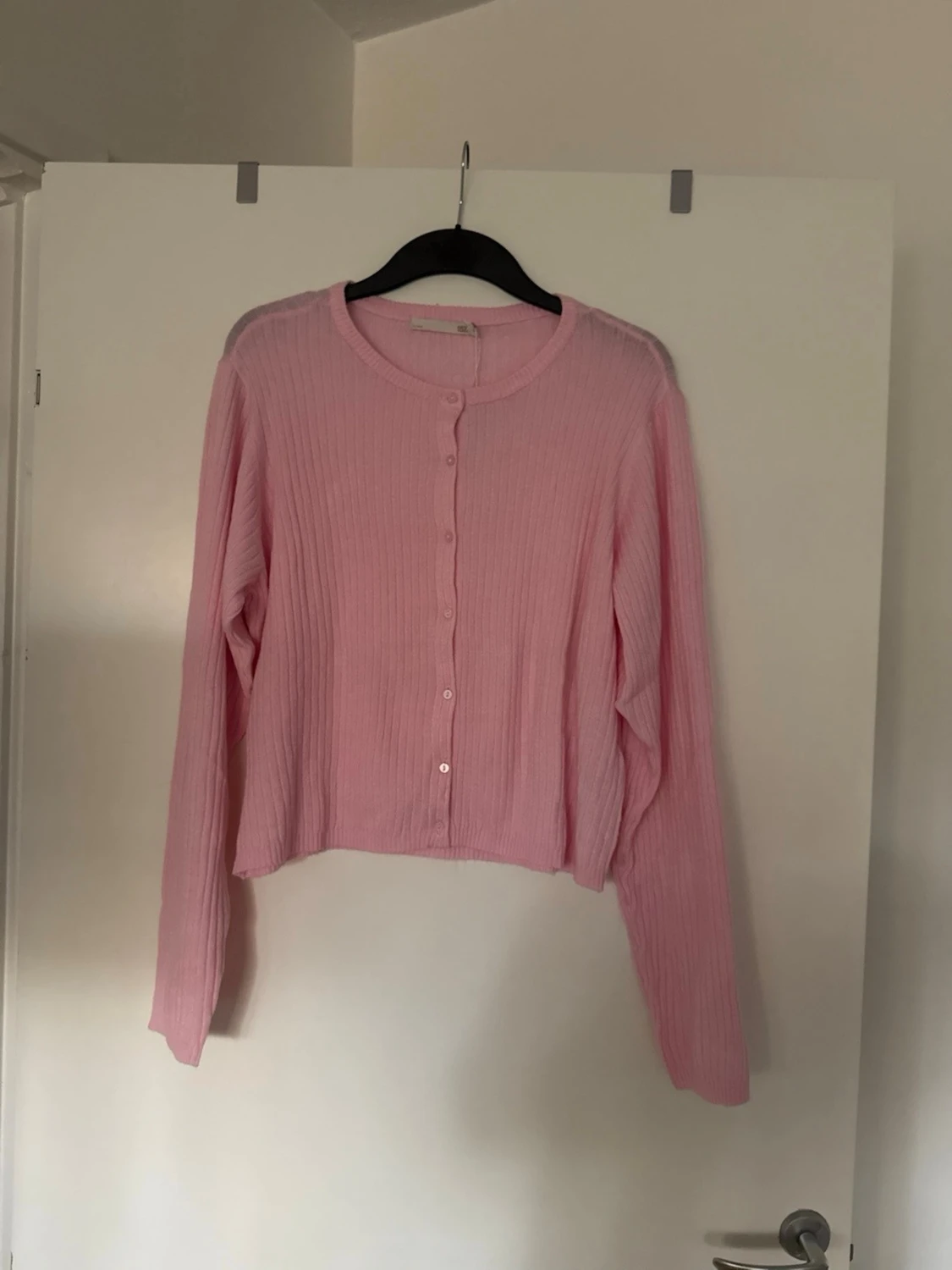Stickad tröja rosa
