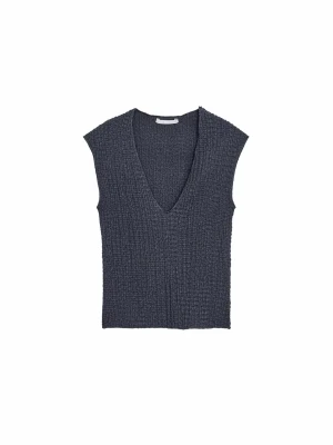 Mörkblå ribbad v-ringad topp - Ny med prislapp kvar - Toppen har en figurnära passform och stretchigt material som ger en snygg siluett. Perfekt för dig som gillar stilrena och trendiga plagg.