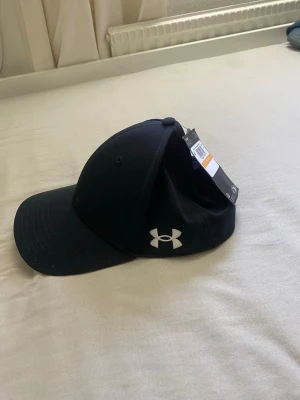 Under Armour flexfit keps - Helt ny Under Armour keps, storlek one size / S/M