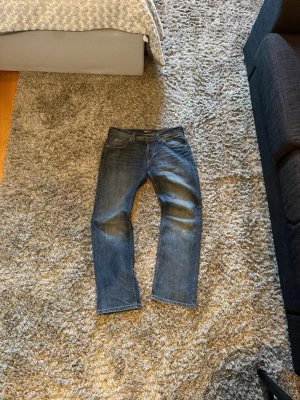 Vintage Lee Jeans Bootcut - Säljer ett par Bootcut Lee jeans i storleken W32 L32. Hör av dig vid frågor!