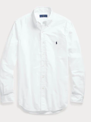Vit skjorta från Ralph Lauren - Klassisk vit skjorta från Ralph Lauren med lång ärm och knappar framtill. Skjortan har en broderad logga på bröstet och är tillverkad i bomull. Perfekt för en clean och stilren look. Helt ny, säljer eftersom den va förliten.