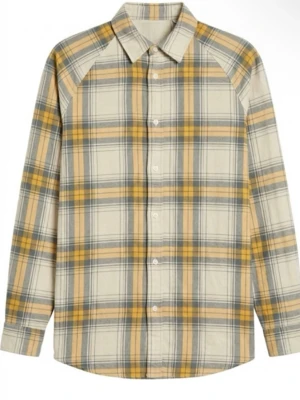 Rutig skjorta i bomull beige/gul - Klassisk rutig skjorta i beige, gul och grå toner. Skjortan har långa ärmar, knappar framtill och en avslappnad passform. Tillverkad i mjuk bomull, perfekt för en chill och stilren look.