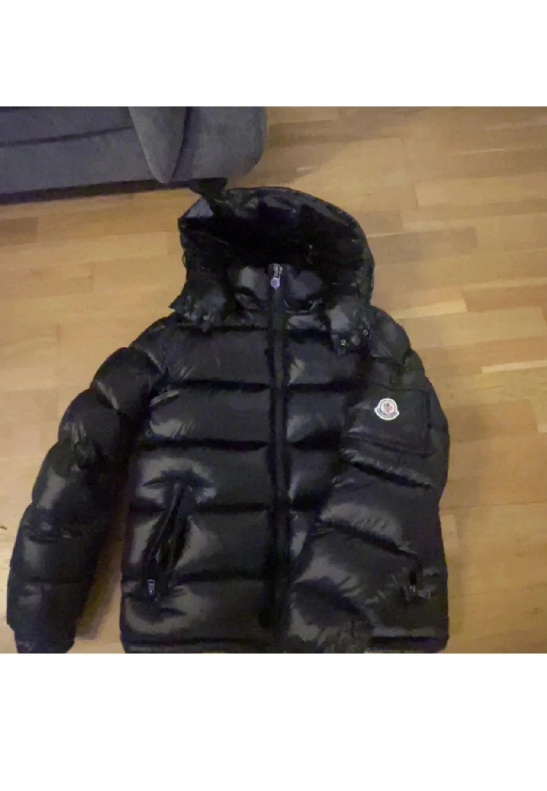 Svart Moncler pufferjacka M