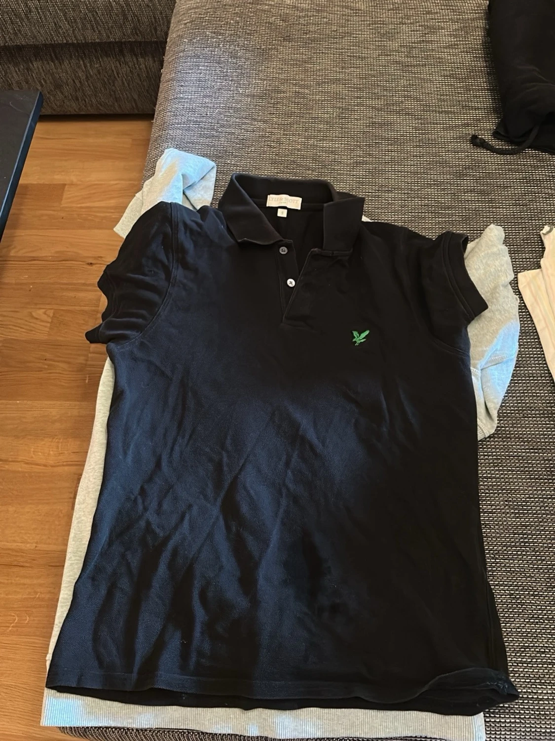 Svart pikétröja från Lyle & Scott