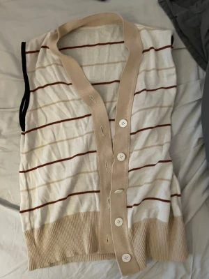 Randig väst - Randig väst från Lotos. Storlek: 42, passar som S. 