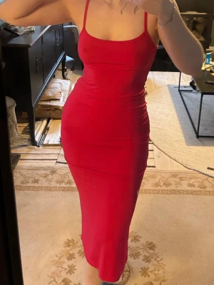 Rosa lång klänning  - Fint skick. Använd ett fåtal gånger 