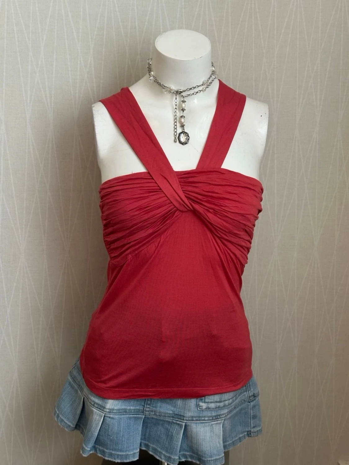  linnetopp med twistade axelband