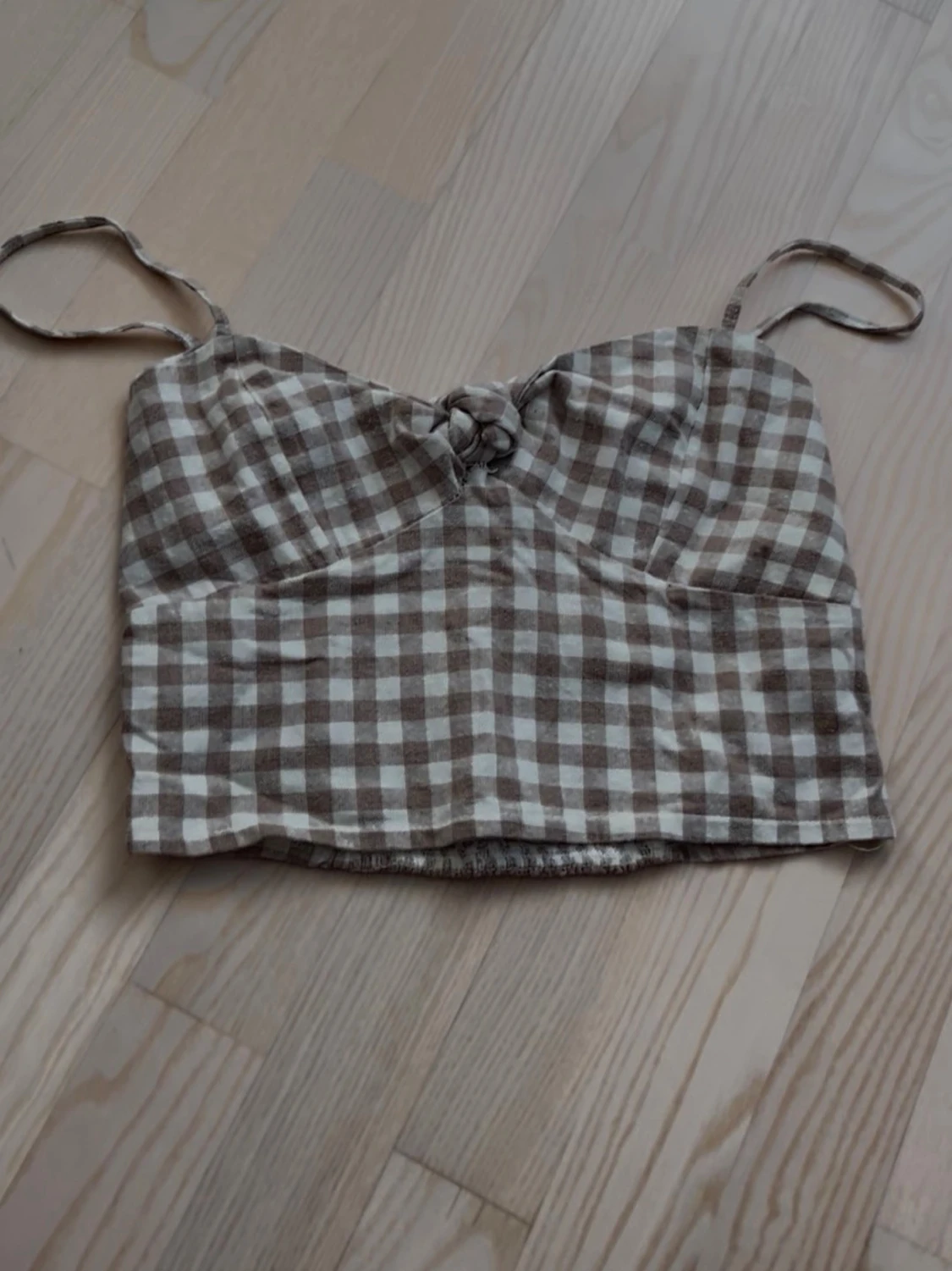 Beige och vit rutig linnetopp