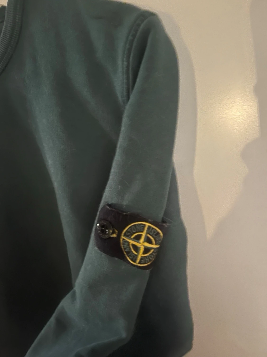 Mörkgrön Stone Island sweatshirt