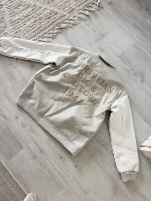 CD Dioir Gray varsity bomber jacket - Size M, true to size. Just like new, very comfortable and high quality.