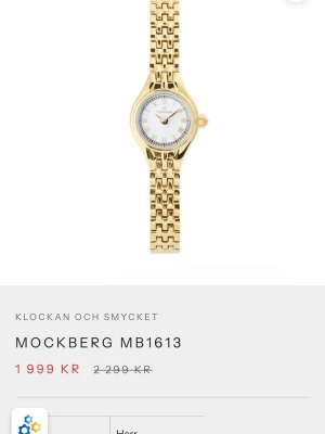 Mockberg heritage petite watch  - Liten guldfärgad klocka i rostfritt stål från mockberg. använd endast ett par gånger så mycket bra skick. 16mm. nypris c 2000 säljer för 1600