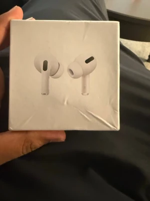 Vita trådlösa in-ear hörlurar - Den som betalar mest för den 