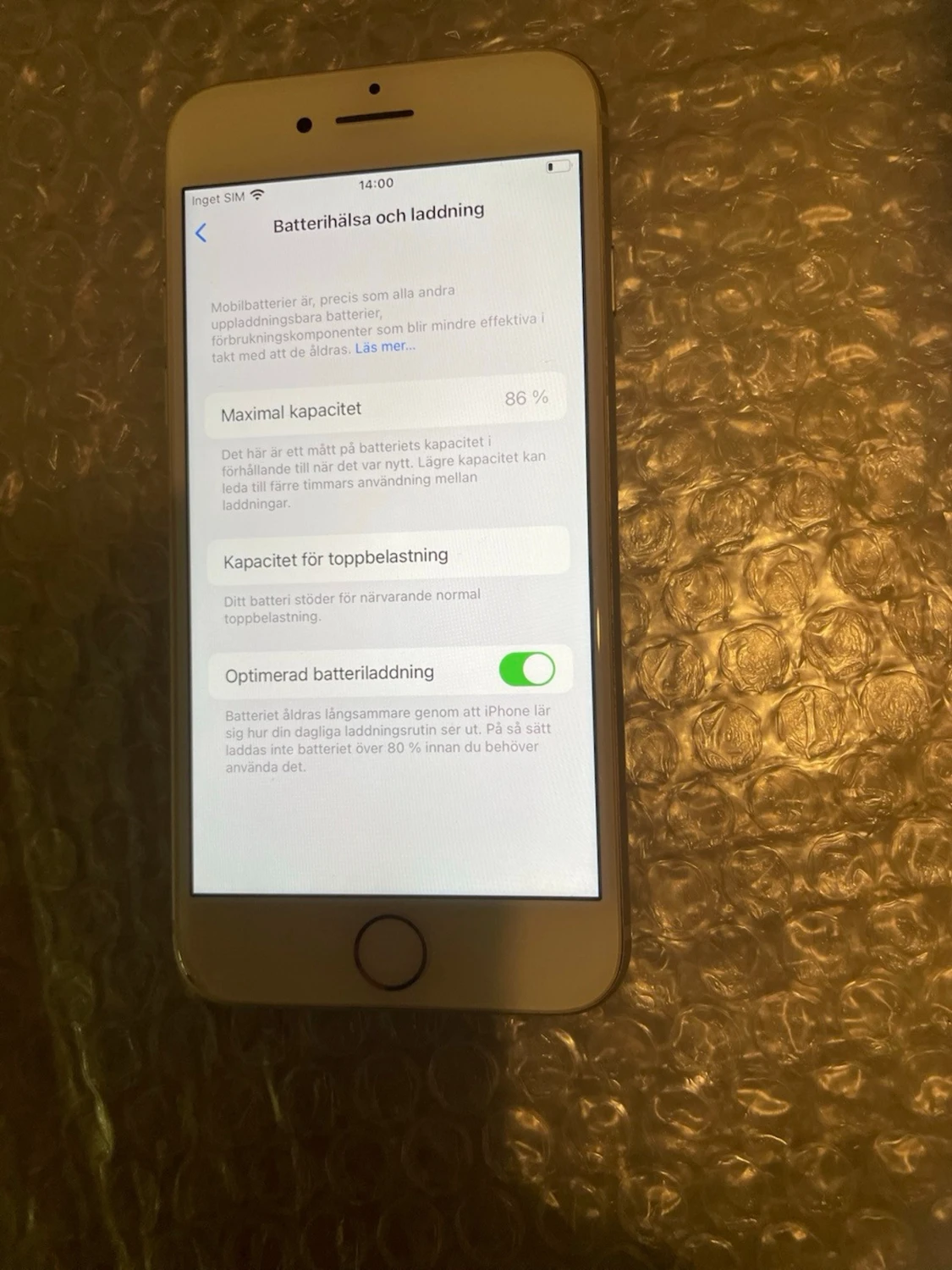 iPhone 8 med iOS-version 16.7.16. Modellnamn MQ6H2QN/A. Batterikapacitet på 86%. - 2