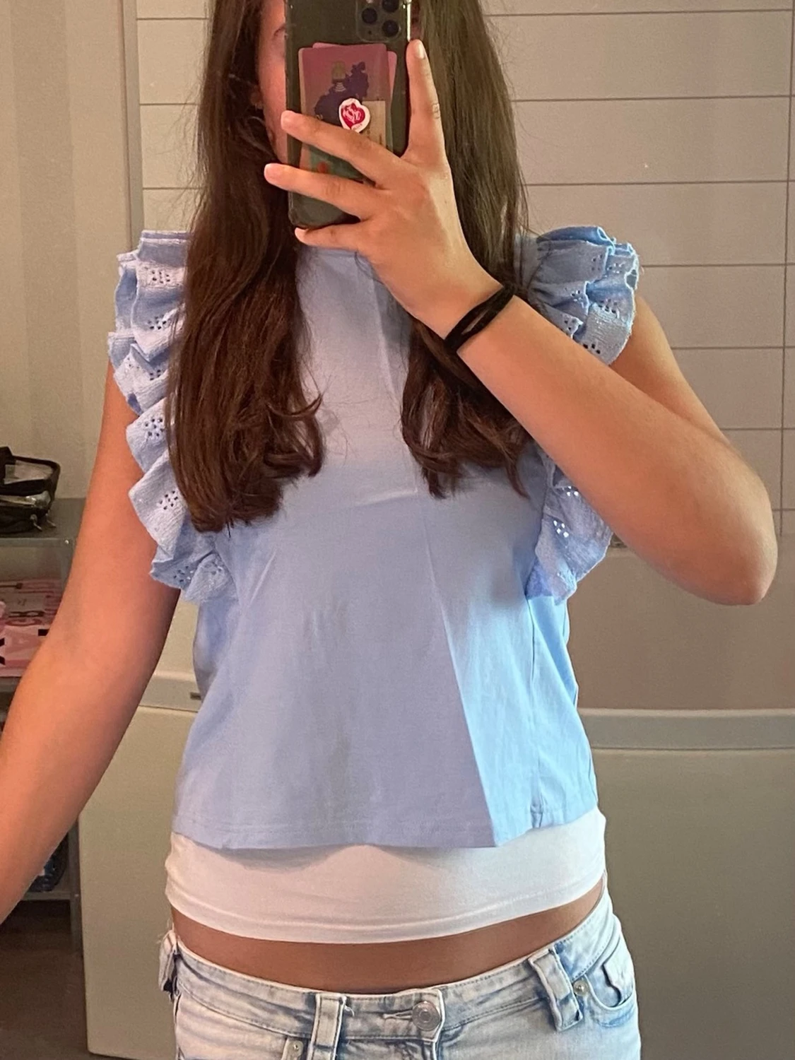 Ljusblå ärmlös topp med volang - 3