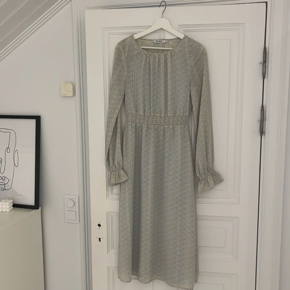 Blommig klänning  - 91