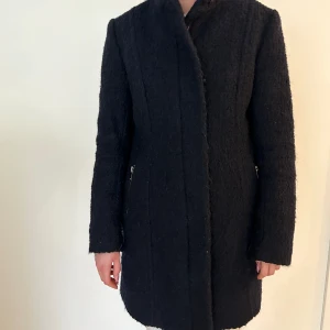 Kappa i Teddy  - Mörkblå Teddy kappa. 