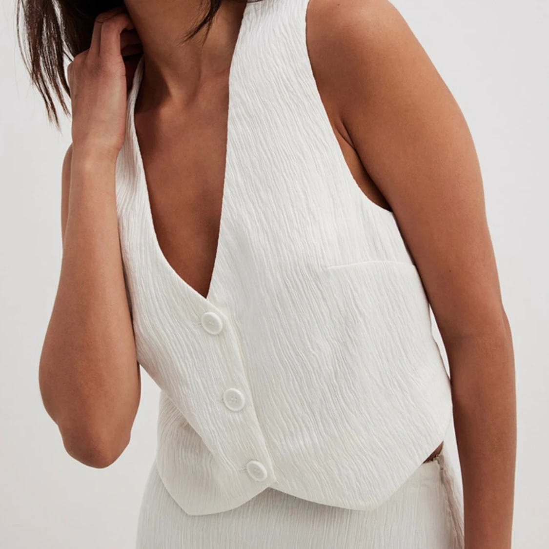 Plisserad vit väst - 90