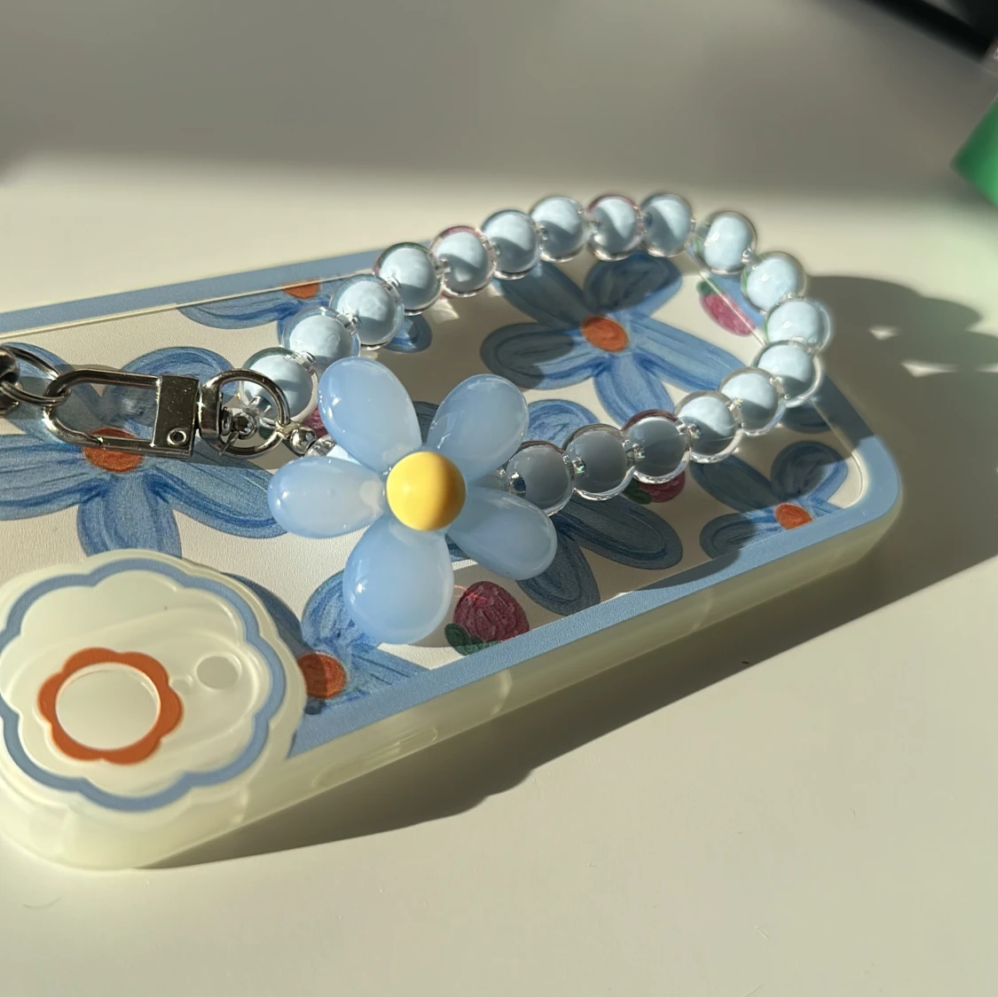 Blommig mobilskal - 90