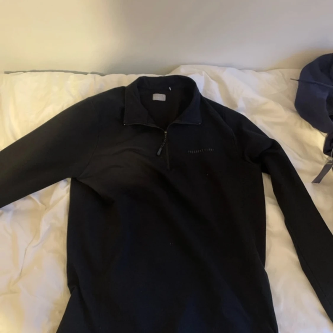 Långärmad svart halfzip
