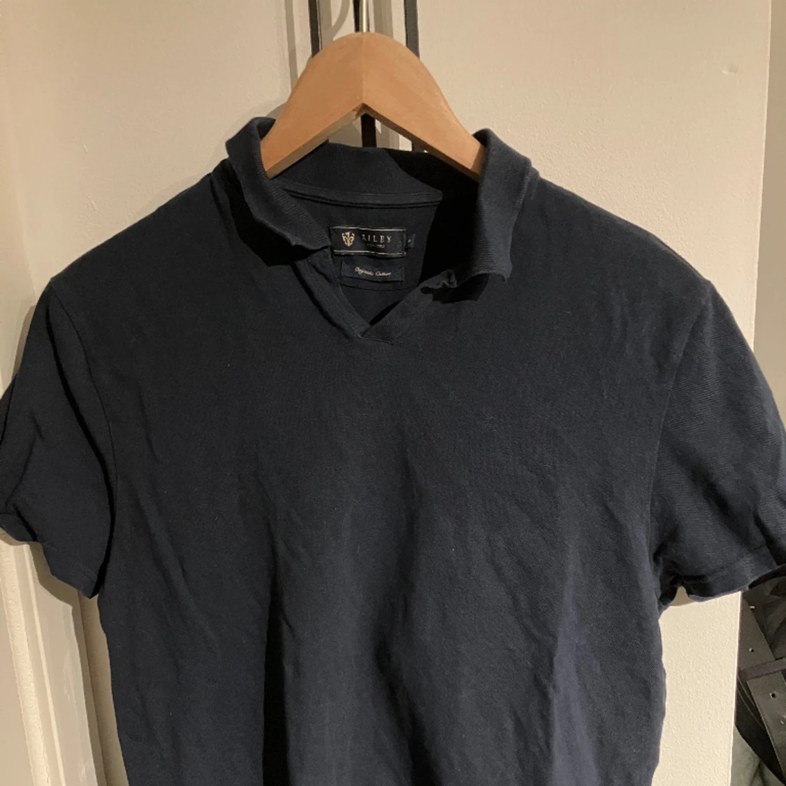 Riley piké tröja mörk blå S