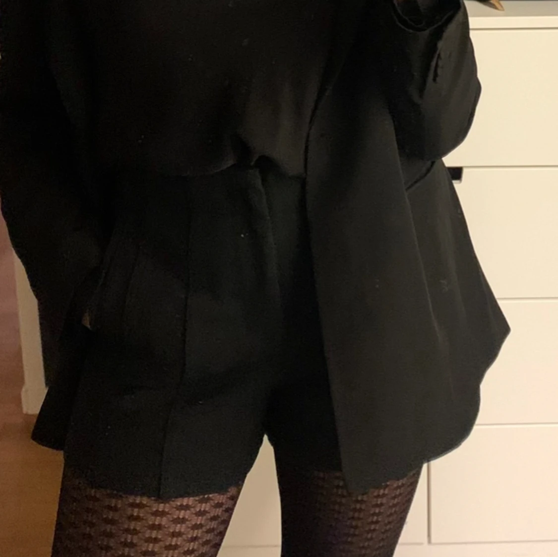 Svarta kostyshorts - 91