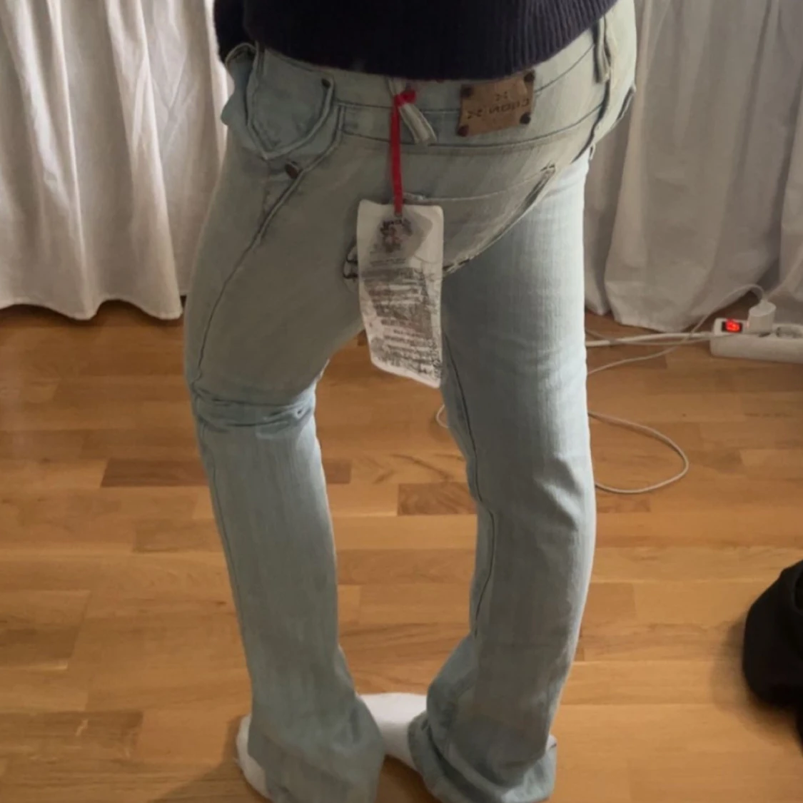 Ljusblå botcut jeans