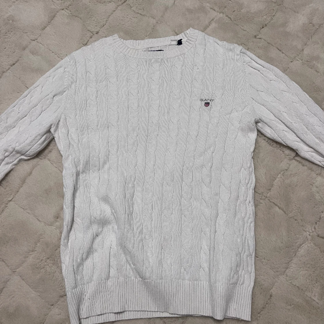 Stickad tröja i märket Gant 