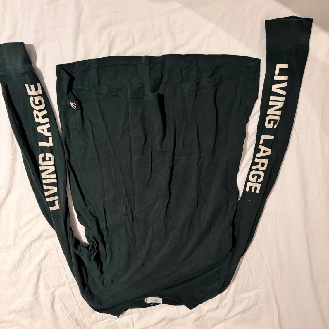 Grön långärmad tröja med tryck