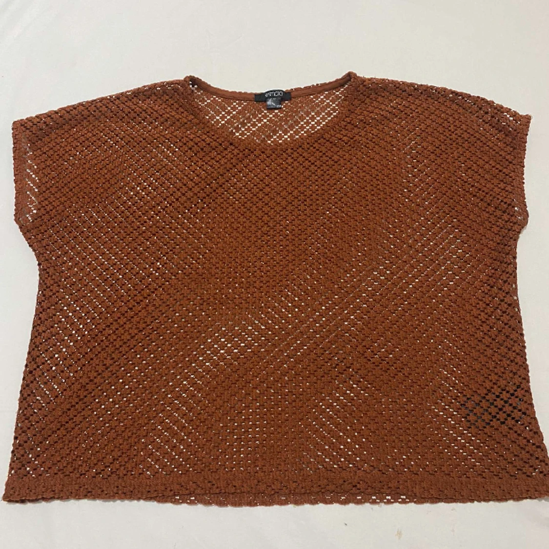 Kort armad  tröja över bikini.