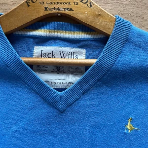 Blå väst  - Finfin väst från Jack Wills. M/L