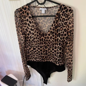 Långärmad body - Storlek XS men passar S också