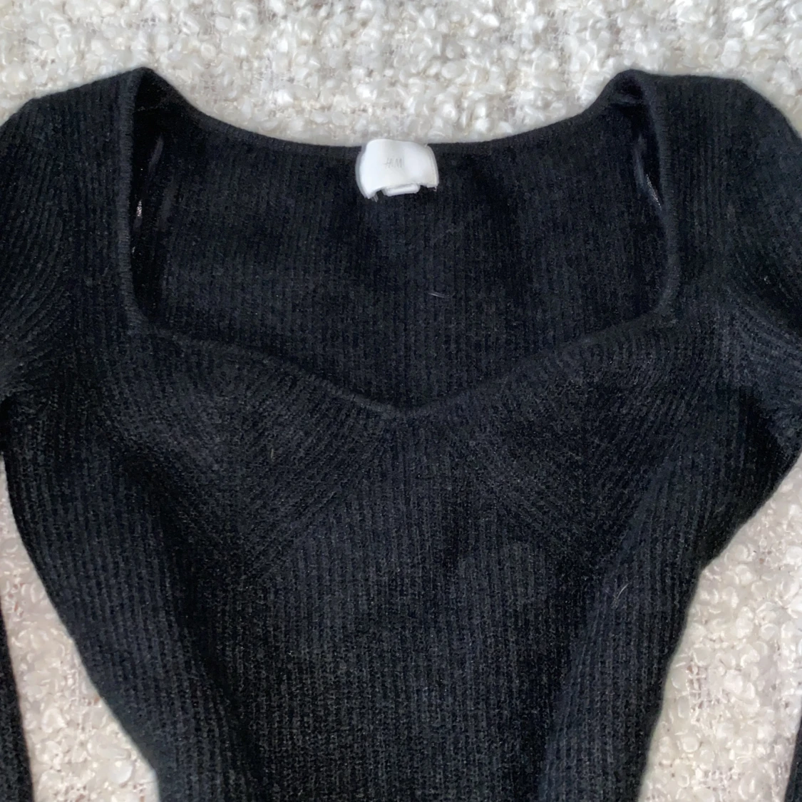 Svart stickad klänning från H&M - 90