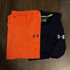 2st under armour tshirtar - Mörkblå helt ny 10/10 Orange använd 7/10 Storlek medium 