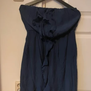 Klänning - Blå bandeu klänning.