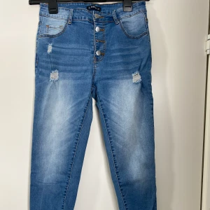Jeans strl M - Ankellånga. Strl M