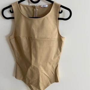 Wolford vegan string body beige - Never used! Original price ~3000kr