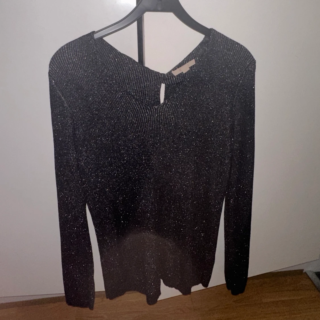 Glittrig långärmad 