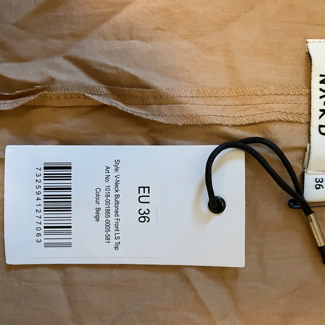 Beige blus med knappar - 92