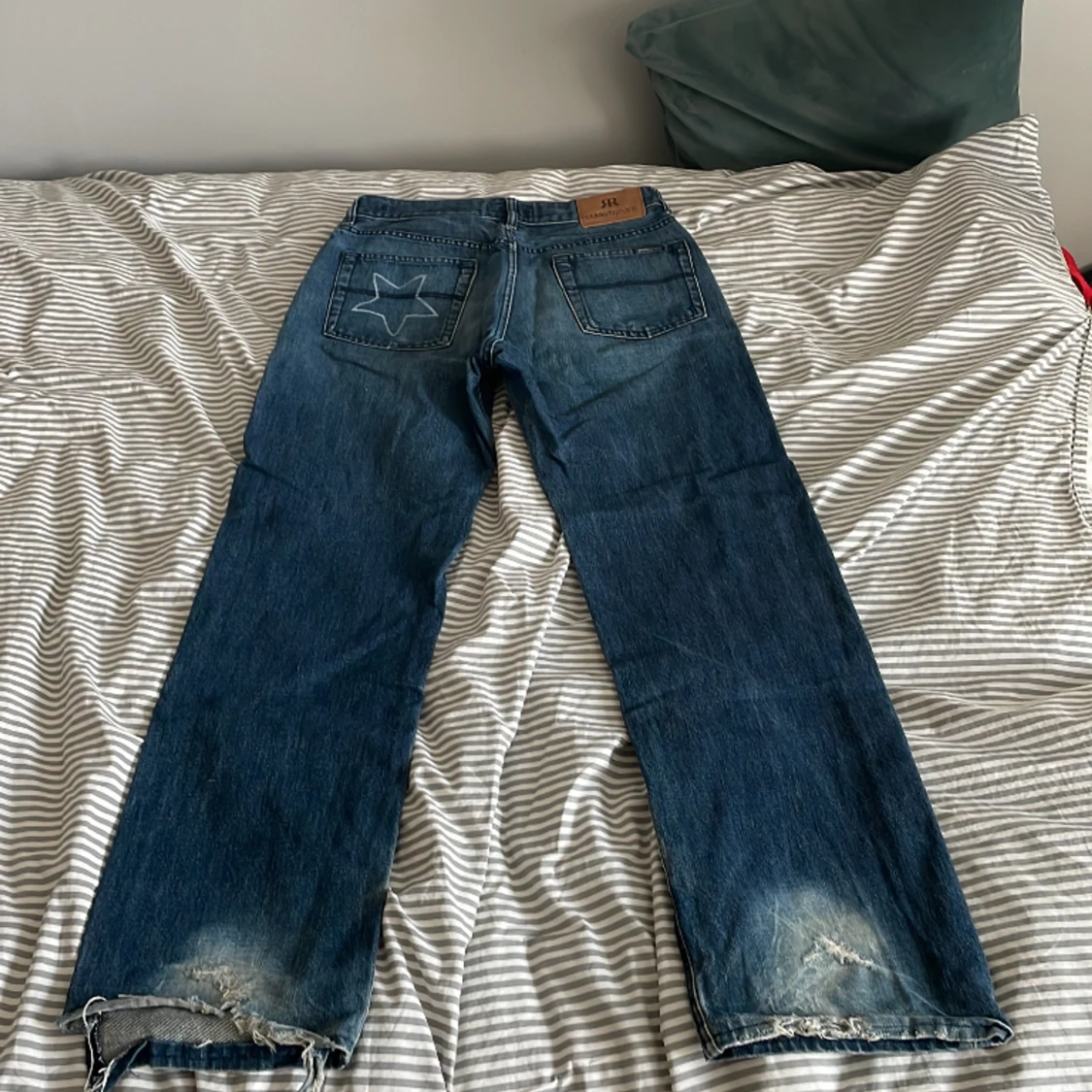Blåa baggy jeans