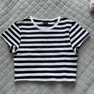 Randig topp - Fint skick. Storlek L. 