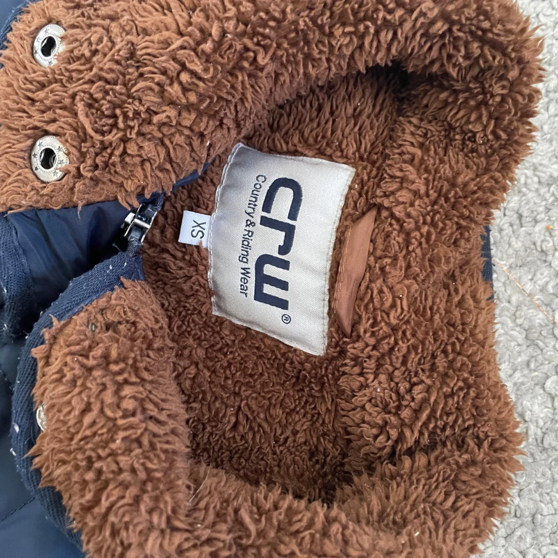 Blå lång vinterridjacka  - 91