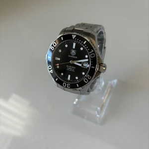 Tag Heuer Aquaracer 300M Automatic  - • Modell: Tag Heuer Aquaracer 300M Automatic • Storlek: 41mm • Referens: Wan2110 • År: 2014 • Skick: Mycket Bra • Medföljer: Fullset + intyg