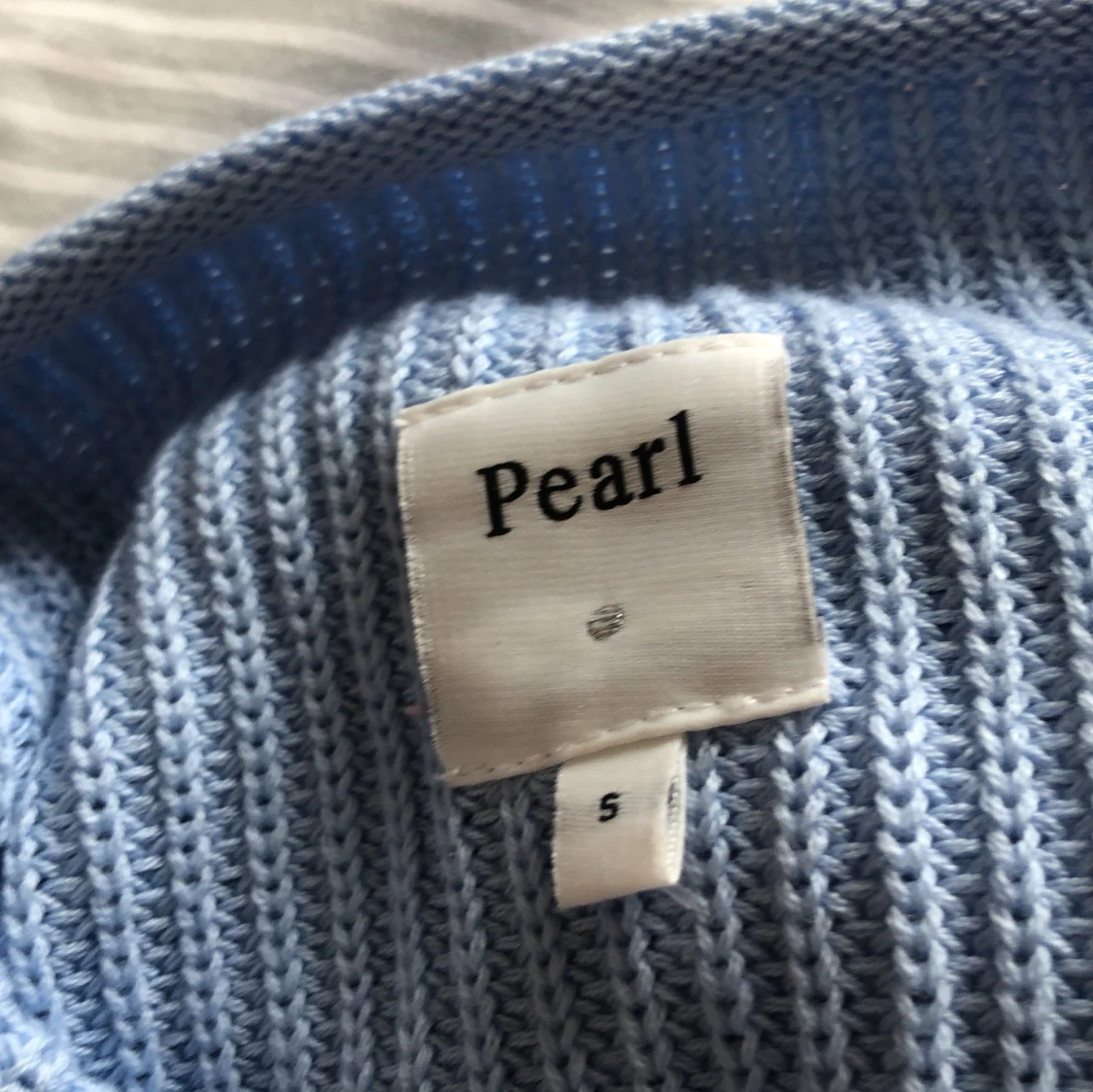 Ljusblå tröja  - 91